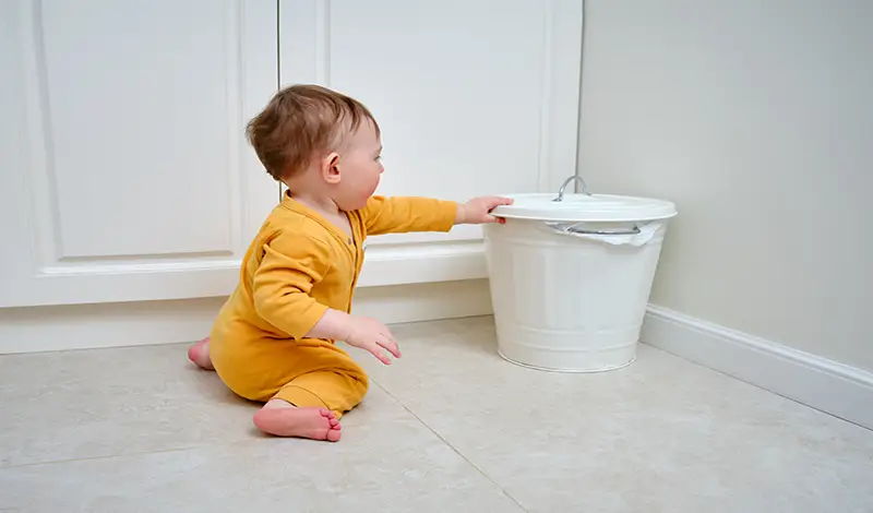 How to Baby-Proof Your Home - Trash.webp