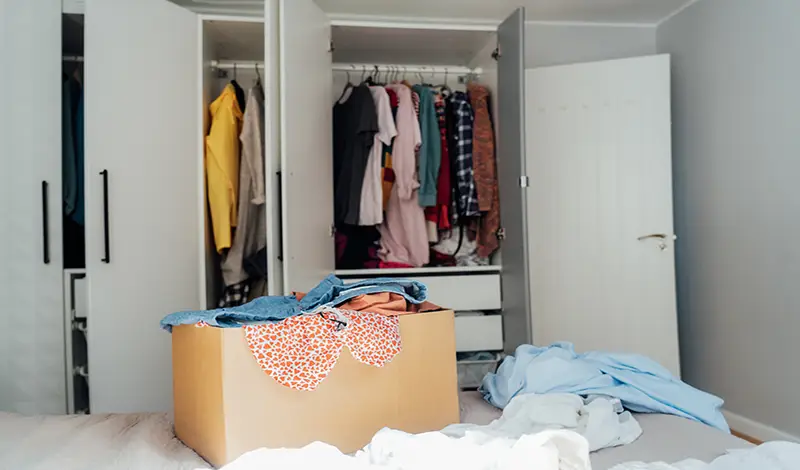 Here's What to Get Rid of Before Moving - Decluttering.webp